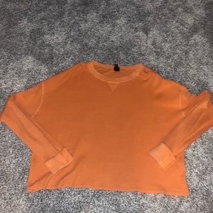 Large orange long sleeve shirt